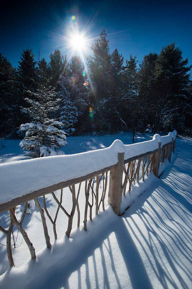 Snow covered outdoor bridge