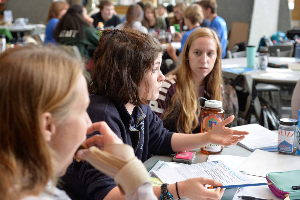 Students at table in discussion