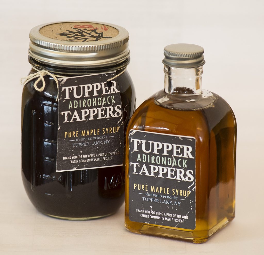 Two different bottles of maple syrup