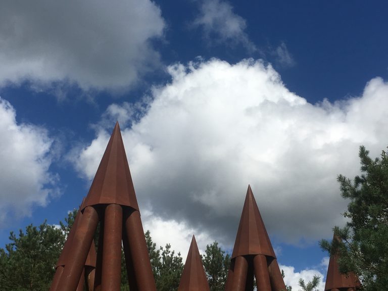 Clouds over the Wild Walk metal towers